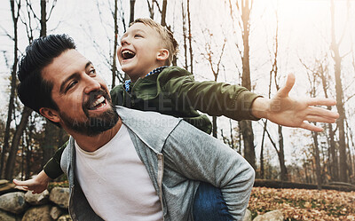 Buy stock photo Nature, piggyback and father with boy in outdoor park for game, fun and bonding together. Forest, playing and happy man with child on back for support, weekend trip or autumn weather in Washington