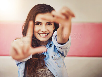 Buy stock photo Portrait of a beautiful young woman posing against a wall outside