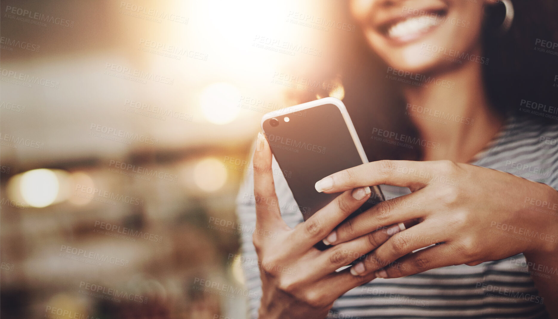 Buy stock photo Smartphone, hands of woman and smile in coffee shop for social media, text and funny meme on internet. Female person, technology and update online in cafe for communication, contact and joke