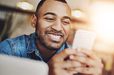 Buy stock photo African man, smartphone and online in cafe with happiness, chatting and match from dating website. Restaurant, male person and cellphone for mobile app, social media and message with contact by flare