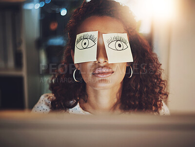 Buy stock photo Shot of a tired young businesswoman working late in an office with sticky notes covering her eyes