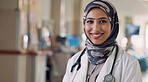 Portrait, Muslim woman and doctor with healthcare, hijab and career ambition in hospital. Face, Islamic person or employee with medical, professional  and surgeon with pride, physician or medicare