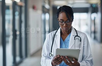 Black woman, doctor and reading online on tablet for test results or review medical records and patient charts or information. Neurologist, digital tech and internet for neuropsychological assessment