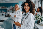 Happy, black nurse and stethoscope in portrait with tablet and team for healthcare, trust and assistance. Female person or doctor with equipment for digital planning surgery and medical support