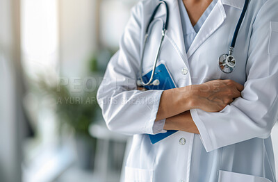 Healthcare, doctor or arms crossed with stethoscope in clinic for wellness appointment, trust or surgery. Closeup, medical worker or cardiology with pride in hospital, consulting or professional