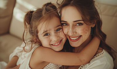 Buy stock photo Hug, child and portrait of mom on sofa with smile for love, protection and peace on Mothers Day. Living room, girl and woman with happiness at home for motherhood, security or support in high angle