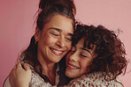 Mom, girl and happy with hug in studio on pink background for mothers day, appreciation and support. Closeup, parent, and daughter with smile for care, love and affection for joy, satisfied as family