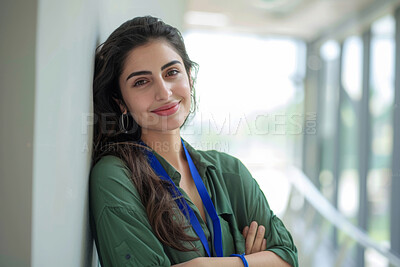 Girl, portrait and student on campus with learning, confident and happy for knowledge. Learner, smile and proud of scholarship opportunity, education and college for academy study with university