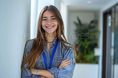 Portrait, smile and business woman with arms crossed in office, workplace or creative company for startup career. Face, happy professional and confident entrepreneur, worker and young editor in USA