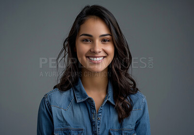 Girl, portrait and student in studio with learning, confident and happy for knowledge. Learner, smile and proud of scholarship opportunity, education and college for academy study on grey background
