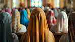 Women, church and religion with community in pew for prayer, sermon or spiritual service with faith. People, audience and crowd with back, scarf and worship with mindfulness at temple in Jerusalem