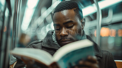 Black man, train and reading with book in travel for knowledge, story or literature in subway station. African or male person with novel for information or learning language in commute or immigration