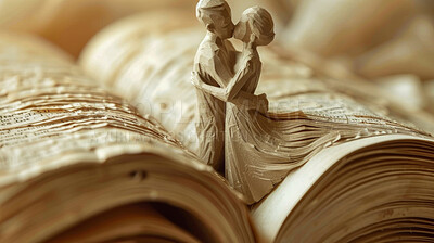 Book, story and sculpture of couple with kiss on page for romance, literature and love in poetry. Man, woman and statue with affection on novel for passion, storytelling and connection in marriage