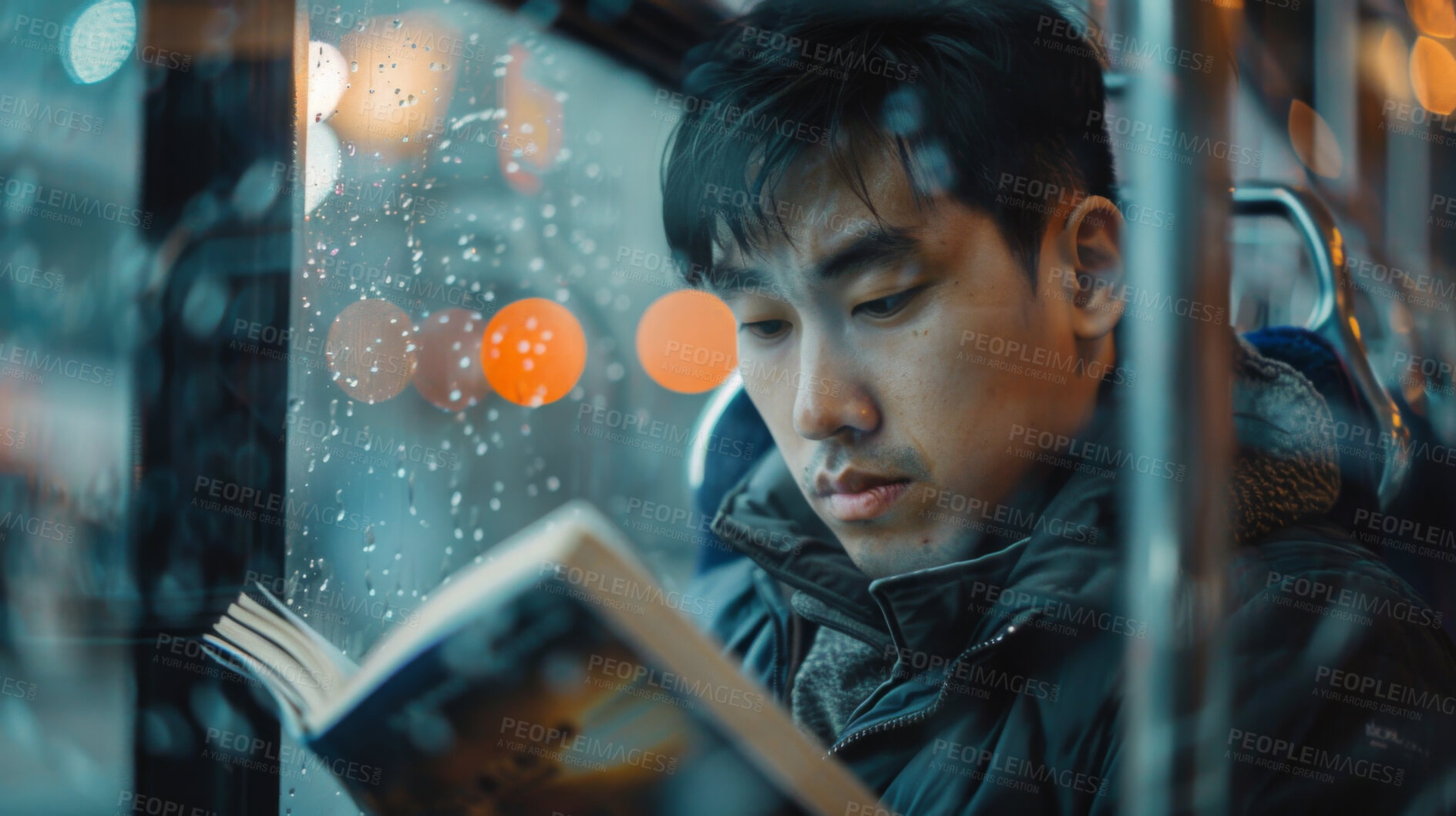 Buy stock photo Train, book and Asian man reading, relaxing and literature with adventure, hobby and journey. Student, transport or guy with memoir, commute and weather with inspiration, raining and knowledge