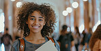 Girl, student and smile in school corridor, learning institute and children or walking for education class. Child, backpack and confident with textbook, happy and goal for development or growth