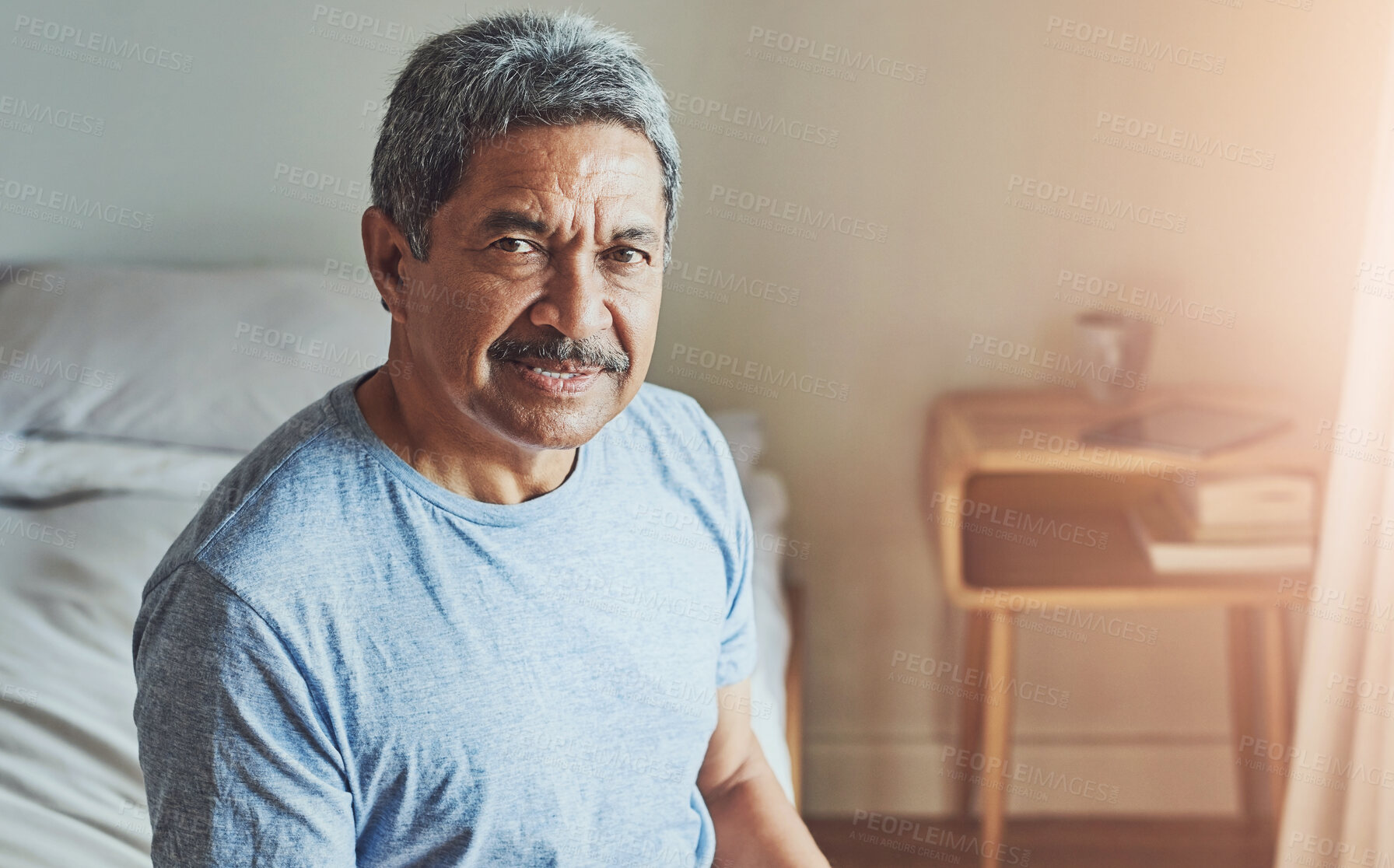 Buy stock photo Portrait, retirement and smile of senior man in bedroom of home to relax for assisted living. Face, proud and wellness with happy elderly person on bed in apartment for old age break or comfort