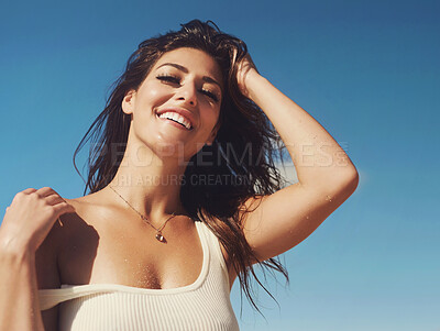 Buy stock photo Cropped shot of a gorgeous young woman on the beach