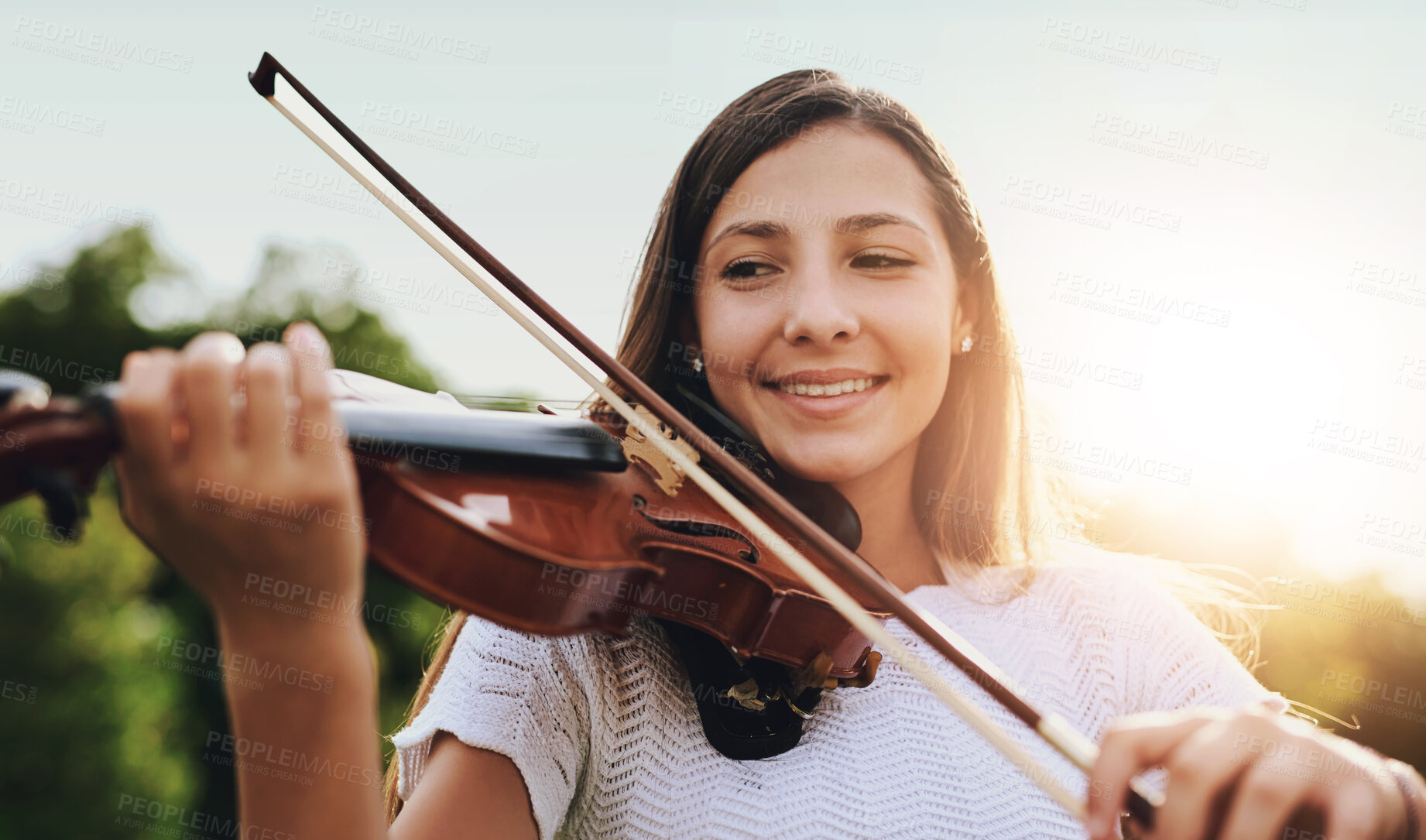 Buy stock photo Face, smile and violin with girl in garden to practice for performance, recital or rehearsal. Art, instrument and music with happy child outdoor in backyard for creative, education or learning