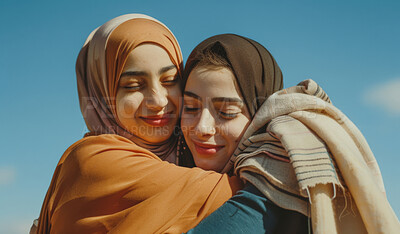 Buy stock photo Outdoor, hijab and muslim women with hug for bonding, appreciation and happy together. Female friends, caring and support with smile for gratitude, embrace and friendship with commitment or trust