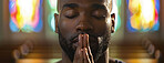 Face, black man and church with praying as Christian for salvation, hope and worship with faith. Religion, healing and respect with praise for guidance, protection and spirituality for connection