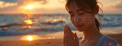 Buy stock photo Asian woman, peace or ocean with praying at sunset for spiritual, worship in nature or meditation. Female person, calm or beach with hands for God or hope in banner, faith and mindfulness with prayer