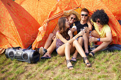 Buy stock photo People, music festival and drinks by tent, excited and relax wellness in nature with friends. Men, woman or happy at social celebration for concert, weekend vacation or bonding in summer fun at party