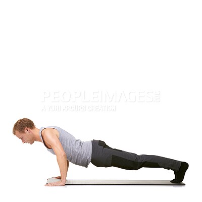 Buy stock photo Man, exercise and mat in studio for push ups, fitness or workout for healthy body, wellness or core muscle. Person, balance and training on floor or abdomen health on mockup space or white background