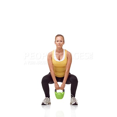 Buy stock photo Fitness, portrait and woman exercise with kettlebell swing, squat or workout for muscle growth, arm strength or bodybuilding. Studio, weightlifting hard work and athlete training on white background