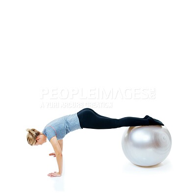 Buy stock photo Woman, fitness and push ups with exercise ball for balance training, workout or health and wellness on a white studio background. Female person or athlete on round object for pilates on mockup space