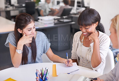 Buy stock photo Business people, teamwork and writing in meeting for magazine, graphic design and project brainstorming or ideas. Group of young women or designer for creative notes, planning or agency collaboration