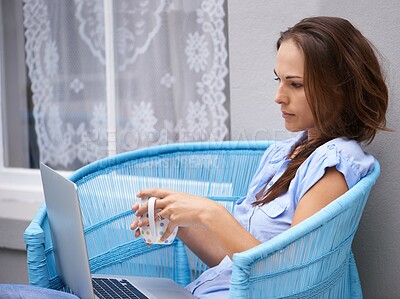 Buy stock photo Woman, reading and laptop for outdoor by house, porch and relax wellness with coffee break for freelancer. Person, email and computer in chair for morning espresso, remote work and job in technology