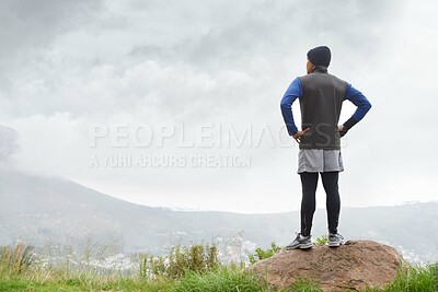 Buy stock photo Runner thinking, fitness and man in nature for training , wellness or outdoor adventure for health. Athlete, back or sports person on mountain peak with idea or inspiration for exercise or workout