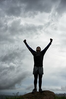Buy stock photo Happy man, mountain peak or hands up for celebration in training, exercise or workout success. Excited athlete, sky or healthy hiker with cheering, gratitude or freedom in nature for fitness