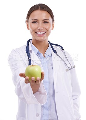 Buy stock photo Doctor, woman and portrait with apple in studio for vitamin c benefits, healthcare and detox on white background. Happy dietician, nutritionist and medical worker with fruits, healthy food and fiber 