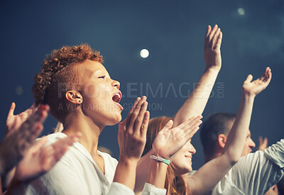 Buy stock photo Young people getting into the music at an awesome concert
