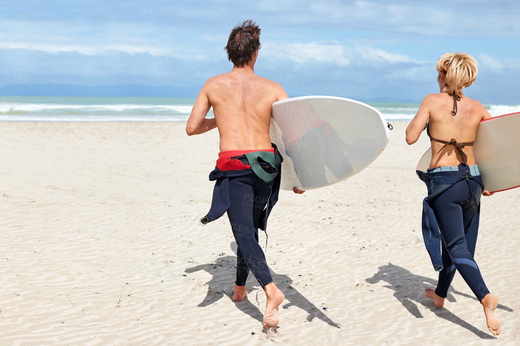 Buy stock photo Surfer couple, running and back at beach with board, training or fitness on vacation in summer. Man, woman or surfboard for wellness, health or workout by ocean, waves or freedom on holiday in nature