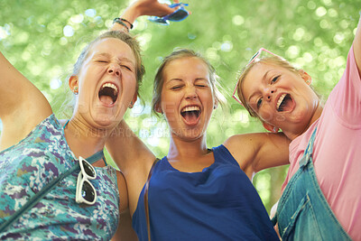 Buy stock photo Excited, friends and group of women in nature on holiday, festival and celebrate weekend outdoors. Happy, scream and people embrace for bonding, fun and relax together on adventure, travel and trip