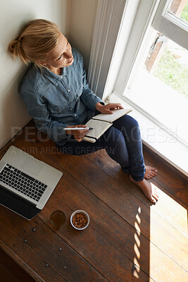 Buy stock photo Woman thinking, floor or writing notes for remote work or internet connection with laptop, drink or ideas. Freelancer, home or writer with notebook for research or working on article in diary journal