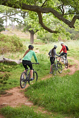Buy stock photo Cycling, fitness and sports people in nature for marathon, race and journey with competition or training on path. Group, athlete or friends on bicycle for outdoor exercise, health or cardio in forest