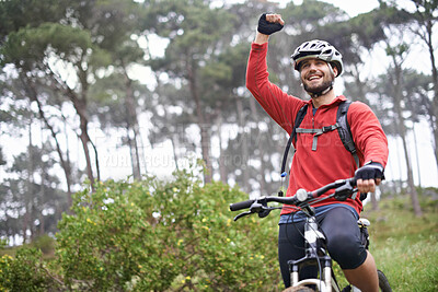 Buy stock photo Fitness, success and man cycling in countryside for adventure, discovery or off road sports hobby. Exercise, winner and celebration with young cyclist on bike in nature for cardio training or workout