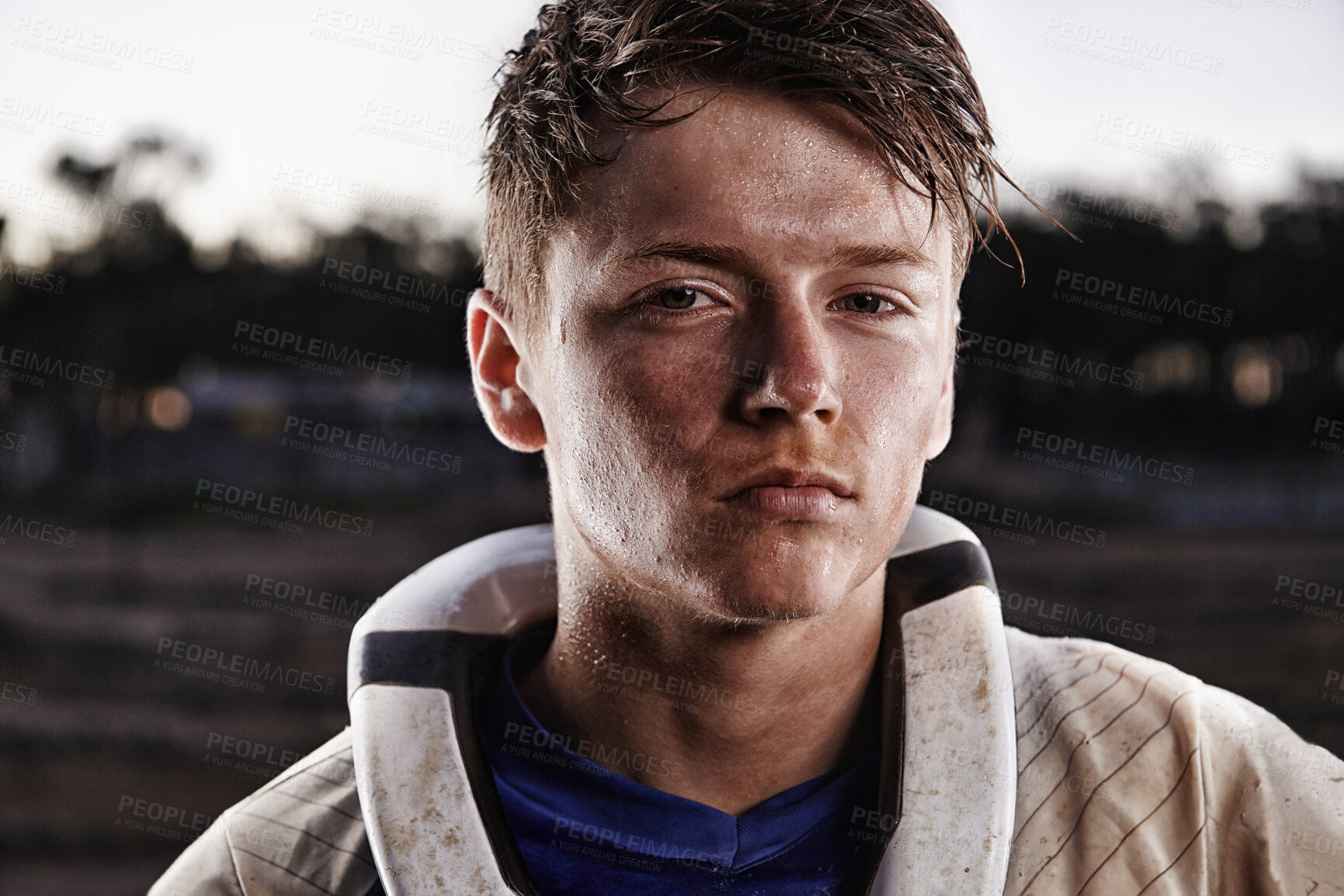 Buy stock photo Sports, dirt bike and portrait of man on offroad in gear for race, challenge or competition. Serious, adventure and face of male athlete motorcyclist with mud at action motorcross rally outdoor.