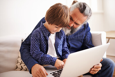 Buy stock photo Grandfather, son and laptop on couch with love and bonding together with online games in living room. Happy family, boy and computer for cartoons in lounge, relax and movie subscription on holiday