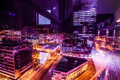 Buy stock photo Buildings, city lights and dark urban background of road, street and building at night. Cityscape architecture, skyscraper and skyline outdoor with buildings and city street neon lighting backgrounds