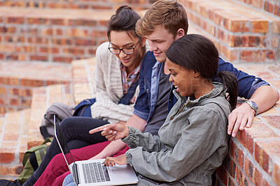 Buy stock photo University, students, and pointing at laptop for education, learning and tuition outdoor. People, study and college youth with tech for internet, connectivity and email for schedule with diversity