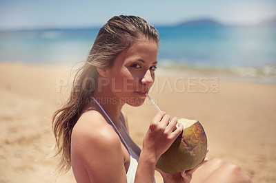 Buy stock photo Portrait, travel or girl at beach for coconut drink, holiday or vacation with beverage or nature in Hawaii. Healthy, relax and happy woman at ocean or sea in summer for tanning or tropical adventure