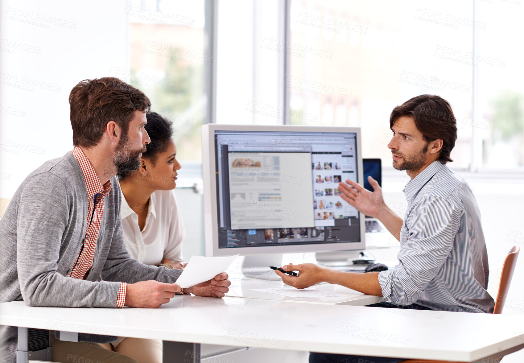 Buy stock photo Portrait of a diverse group of businesspeople sitting in an office