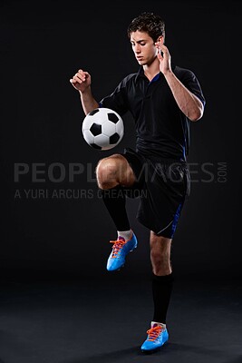 Buy stock photo Man, football and skill for fitness in studio for sports training with exercise isolated on black background. Talent, sport and male athlete with control in soccer kit with healthy professional.