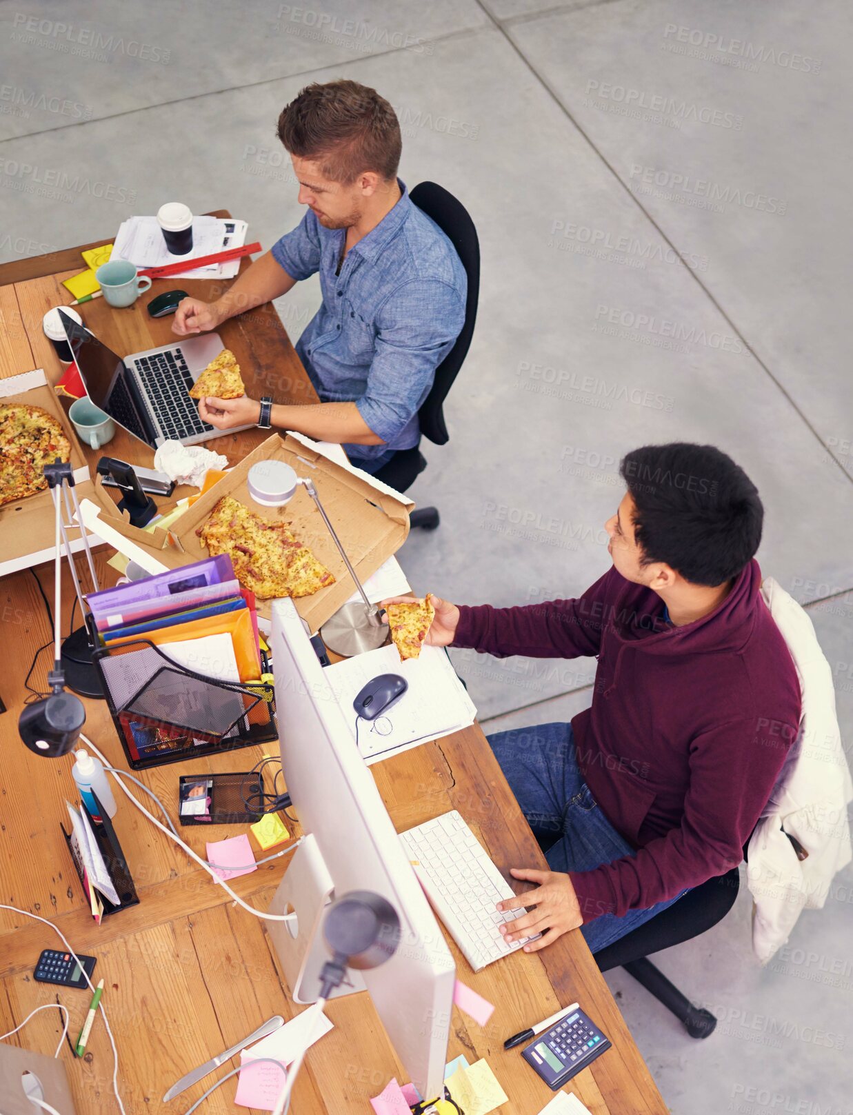Buy stock photo Business people, men and working while eating with top view for deadline, pizza and coworking company. Programmer, teamwork and technology on lunch with fast food, coding and software development 