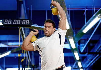 Buy stock photo Fitness, man and workout with kettlebell in gym for energy, wellness or healthy body. Serious, person and strong bodybuilder weightlifting for muscle, power or training to exercise for sports at club