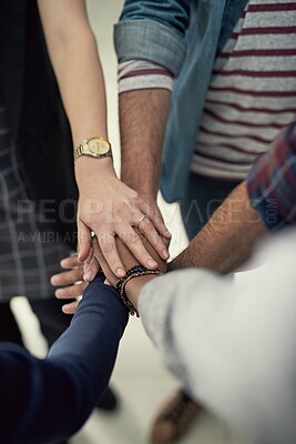 Buy stock photo Hands together, teamwork and top view of business people with success, partnership or celebrate goal in creative startup. Above, huddle and group of employees with support for community of designers